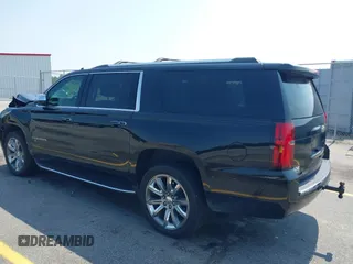 2019 Chevrolet Suburban LT with VIN 1GNSCJKC5KR304766, listed as a IAAI auction lot 42410264 with 105,171 mi miles and . Bid and sale history available at DreamBid. Image 3.