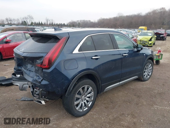 2021 Cadillac XT4 FWD Premium Luxury with VIN 1GYFZCR41MF041306, listed as a IAAI auction lot 41143747 with 53,116 mi miles. Bid and sale history available at carsss.com. Image 4.