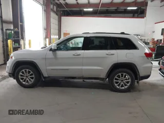 2014 Jeep Grand Cherokee Laredo with VIN 1C4RJFAG4EC309401, listed as a IAAI auction lot 41996233 with 243,541 mi miles and . Bid and sale history available at DreamBid. Image 14.