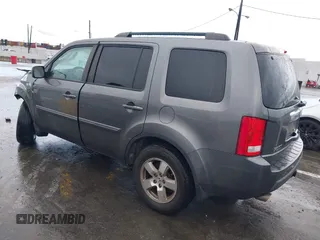 2011 Honda Pilot EX with VIN 5FNYF3H49BB026174, listed as a IAAI auction lot 41795460 with 201,488 mi miles and . Bid and sale history available at carsss.com. Image 3.