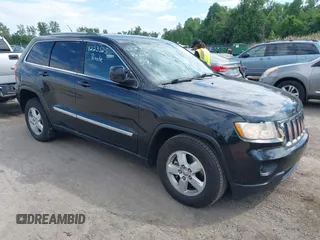 2011 Jeep Grand Cherokee Laredo z VIN 1J4RR4GG0BC546669, wystawiony jako IAAI lot #42235250 z przebiegiem 169 733 mil mil oraz . Historia ofert i sprzedaży dostępna na DreamBid. Obrazek 1.