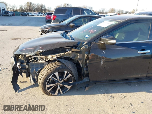 2016 Nissan Maxima Platinum z VIN 1N4AA6AP6GC430470, wystawiony jako IAAI lot #41390041 z przebiegiem 86 483 mil mil oraz . Historia ofert i sprzedaży dostępna na DreamBid. Obrazek 6.