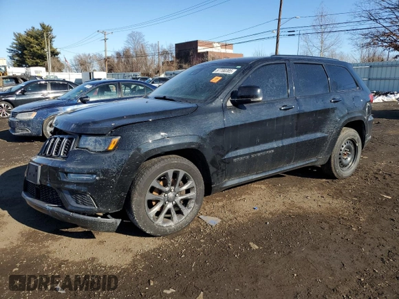 2018 Jeep Grand Cherokee High Altitude with VIN 1C4RJFCG3JC488022, listed as a Copart auction lot 87700385 with 94,390 mi miles and Salvage title. Bid and sale history available at DreamBid. Image 1.