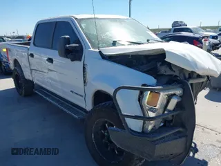 2021 Ford Super Duty F-250 SRW XL with VIN 1FT7W2BT3MEC30933, listed as a IAAI auction lot 41836915 with 100,089 mi miles. Bid and sale history available at carsss.com. Image 1.