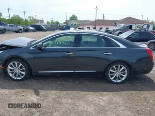 2013 Cadillac XTS Luxury with VIN 2G61P5S3XD9244824, listed as a IAAI auction lot 42384480 with 78,192 mi miles and . Bid and sale history available at DreamBid. Image 14.