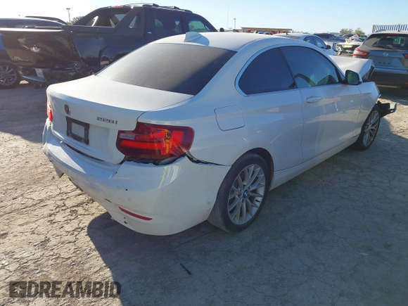 2015 BMW 2 Series 228i with VIN WBA1F5C53FV257086, listed as a IAAI auction lot 40898527 with 83,779 mi miles. Bid and sale history available at carsss.com. Image 4.