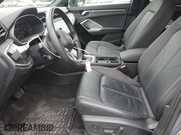 2020 Audi Q3 Premium with VIN WA1AECF31L1002342, listed as a Copart auction lot 60729665 with 29,154 mi miles and Salvage title. Bid and sale history available at DreamBid. Image 7.
