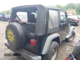 2004 Jeep Wrangler SE with VIN 1J4FA291X4P800973, listed as a IAAI auction lot 42691809 with 116,942 mi miles and . Bid and sale history available at DreamBid. Image 4.