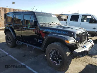 2022 Jeep Wrangler Unlimited Rubicon with VIN 1C4JJXR64NW198894, listed as a Copart auction lot 49899255 with 25,120 mi miles and Salvage title. Bid and sale history available at DreamBid. Image 4.