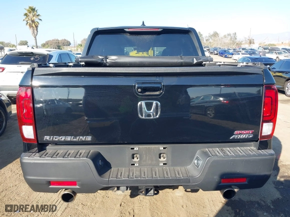 2021 Honda Ridgeline Sport with VIN 5FPYK3F14MB013671, listed as a IAAI auction lot 41361179 with 91,121 mi miles. Bid and sale history available at carsss.com. Image 16.
