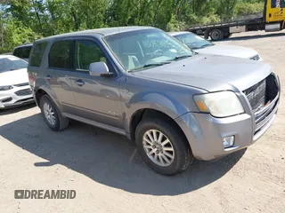 2008 Mercury Mariner Premier z VIN 4M2CU87168KJ15064, wystawiony jako IAAI lot #42240706 z przebiegiem 145 243 mil mil oraz . Historia ofert i sprzedaży dostępna na DreamBid. Obrazek 1.
