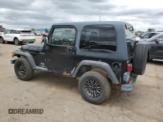 2003 Jeep Wrangler Sport z VIN 1J4FA49S13P374688, wystawiony jako Copart lot #58296735 z przebiegiem 184 554 mil mil oraz Czysty tytuł • Clean title. Historia ofert i sprzedaży dostępna na DreamBid. Obrazek 2.