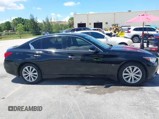 2015 Infiniti Q50 Premium with VIN JN1BV7AR2FM408326, listed as a IAAI auction lot 42580193 with 167,185 mi miles and . Bid and sale history available at DreamBid. Image 13.