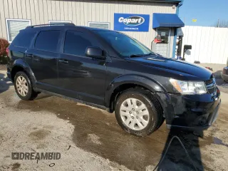 2013 Dodge Journey SXT with VIN 3C4PDCBGXDT503591, listed as a Copart auction lot 52322895 with 186,196 mi miles and Non repairable. Bid and sale history available at DreamBid. Image 4.