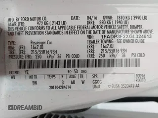 2016 Ford Focus SE with VIN 1FADP3F2XGL324613, listed as a IAAI auction lot 41971597 with 126,738 mi miles. Bid and sale history available at carsss.com. Image 9.
