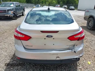 2014 Ford Focus SE with VIN 1FADP3F28EL162669, listed as a IAAI auction lot 42128555 with 104,265 mi miles and . Bid and sale history available at carsss.com. Image 16.