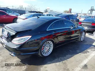 2012 Mercedes-Benz CLS-Class CLS 63 AMG with VIN WDDLJ7EB8CA034348, listed as a IAAI auction lot 41814988 with 138,744 mi miles. Bid and sale history available at carsss.com. Image 4.