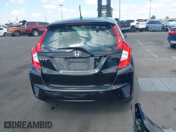 2015 Honda Fit LX z VIN 3HGGK5H52FM765921, wystawiony jako IAAI lot #42135740 z przebiegiem 82 647 mil mil oraz . Historia ofert i sprzedaży dostępna na DreamBid. Obrazek 17.