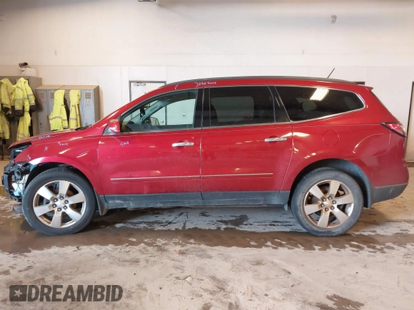 2014 Chevrolet Traverse LTZ z VIN 1GNKRJKD8EJ210990, wystawiony jako IAAI lot #41655601 z przebiegiem 218 804 mil mil oraz . Historia ofert i sprzedaży dostępna na DreamBid. Obrazek 14.