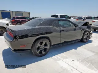 2014 Dodge Challenger R/T Plus z VIN 2C3CDYBT0EH122467, wystawiony jako Copart lot #58392365 z przebiegiem 136 793 mil mil oraz Szkoda całkowita • Salvage title. Historia ofert i sprzedaży dostępna na DreamBid. Obrazek 3.