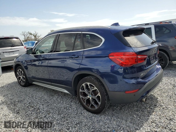 2020 BMW X1 xDrive28i with VIN WBXJG9C0XL5R33141, listed as a Copart auction lot 63040155 with 165,172 mi miles and Clean title. Bid and sale history available at DreamBid. Image 2.