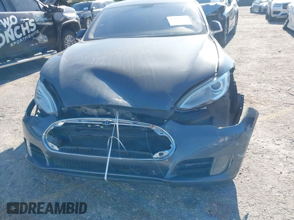 2014 Tesla Model S 60 with VIN 5YJSA1H1XEFP31911, listed as a IAAI auction lot 42029215 with Not Provided miles and . Bid and sale history available at DreamBid. Image 6.