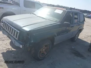 1996 Jeep Grand Cherokee Laredo with VIN 1J4FX58S9TC300710, listed as a IAAI auction lot 42073391 with 1 mi miles. Bid and sale history available at carsss.com. Image 17.