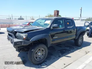 2008 Toyota Tacoma PreRunner with VIN 3TMJU62NX8M070067, listed as a IAAI auction lot 42315725 with 184,300 mi miles and . Bid and sale history available at DreamBid. Image 2.
