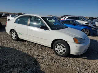 2002 Honda Civic z VIN 1HGEN26532L000390, wystawiony jako Copart lot #80095344 z przebiegiem 162 638 mil mil oraz Czysty tytuł • Clean title. Historia ofert i sprzedaży dostępna na DreamBid. Obrazek 4.