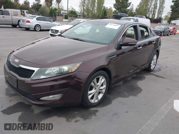 2013 Kia Optima LX z VIN 5XXGM4A72DG208410, wystawiony jako IAAI lot #42078867 z przebiegiem 89 033 mil mil oraz . Historia ofert i sprzedaży dostępna na DreamBid. Obrazek 2.