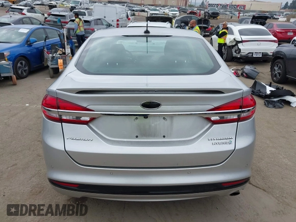 2017 Ford Fusion Hybrid Titanium z VIN 3FA6P0RU7HR300311, wystawiony jako IAAI lot #42045664 z przebiegiem 136 231 mil mil oraz . Historia ofert i sprzedaży dostępna na DreamBid. Obrazek 16.