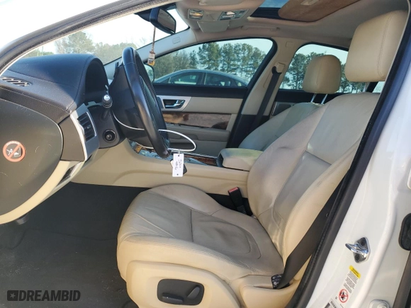 2015 Jaguar XF I4 T Premium with VIN SAJWA0FS5FPU58943, listed as a Copart auction lot 46973695 with 98,011 mi miles and Salvage Title. Bid and sale history available at carsss.com. Image 7.
