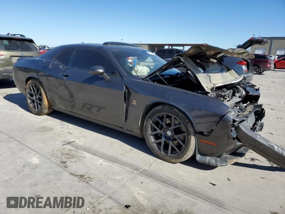 2016 Dodge Challenger 392 Hemi Scat Pack Shaker z VIN 2C3CDZFJ8GH279147, wystawiony jako Copart lot #41882095 z przebiegiem 98 874 mil mil oraz Szkoda całkowita • Salvage title. Historia ofert i sprzedaży dostępna na DreamBid. Obrazek 4.
