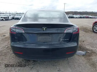 2021 Tesla Model 3 Long Range with VIN 5YJ3E1EB4MF012822, listed as a IAAI auction lot 41918721 with 69,105 mi miles. Bid and sale history available at carsss.com. Image 16.