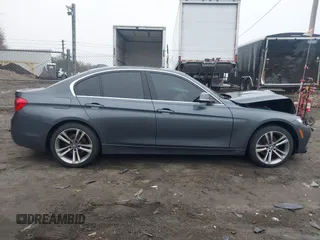2018 BMW 3 Series with VIN WBA8F1C54JAE93207, listed as a IAAI auction lot 41876781 with 64,749 mi miles and . Bid and sale history available at DreamBid. Image 13.
