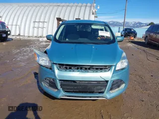 2013 Ford Escape SE z VIN 1FMCU9GX3DUC55471, wystawiony jako IAAI lot #41484007 z przebiegiem 174 381 mil mil oraz . Historia ofert i sprzedaży dostępna na DreamBid. Obrazek 12.