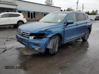 2019 Volkswagen Tiguan SE with VIN 3VV2B7AX0KM069957, listed as a Copart auction lot 64079615 with 103,132 mi miles and Salvage title. Bid and sale history available at DreamBid. Image 1.