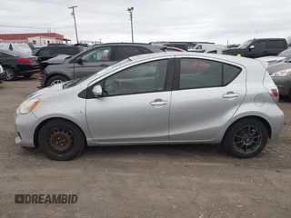 2014 Toyota Prius One with VIN JTDKDTB35E1557798, listed as a IAAI auction lot 41753972 with 182,543 mi miles and . Bid and sale history available at DreamBid. Image 14.