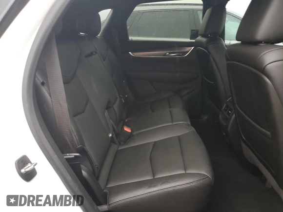 2022 Cadillac XT5 FWD Luxury z VIN 1GYKNAR48NZ163921, wystawiony jako Copart lot #74507874 z przebiegiem 5 723 mil mil oraz Nie do naprawy • Non repairable. Historia ofert i sprzedaży dostępna na DreamBid. Obrazek 11.