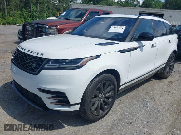 2018 Land Rover Range Rover Velar R-Dynamic SE z VIN SALYL2RN6JA758868, wystawiony jako IAAI lot #42378594 z przebiegiem 104 767 mil mil oraz . Historia ofert i sprzedaży dostępna na DreamBid. Obrazek 17.