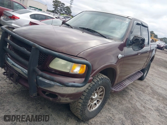 2002 Ford F-150 XLT with VIN 1FTRW08L02KA72005, listed as a IAAI auction lot 41723821 with 284,313 mi miles. Bid and sale history available at carsss.com. Image 2.