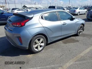 2019 Hyundai Veloster 2.0 with VIN KMHTG6AF8KU019854, listed as a IAAI auction lot 41697113 with 123,851 mi miles. Bid and sale history available at carsss.com. Image 4.