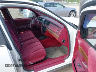 1993 Ford Crown Victoria z VIN 2FACP74W2PX101414, wystawiony jako IAAI lot #42001080 z przebiegiem 76 046 mil mil oraz . Historia ofert i sprzedaży dostępna na DreamBid. Obrazek 5.