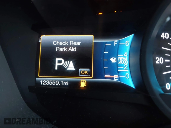 2016 Ford Fusion Titanium with VIN 3FA6P0K96GR390989, listed as a IAAI auction lot 42634275 with 123,559 mi miles and . Bid and sale history available at DreamBid. Image 15.