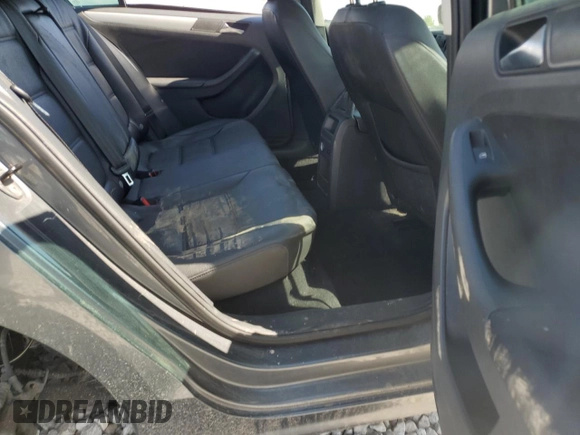 2012 Volkswagen Jetta TDI w/Premium & Nav z VIN 3VWLL7AJ2CM358901, wystawiony jako Copart lot #57350505 z przebiegiem 155 062 mil mil oraz Szkoda całkowita • Salvage title. Historia ofert i sprzedaży dostępna na DreamBid. Obrazek 10.