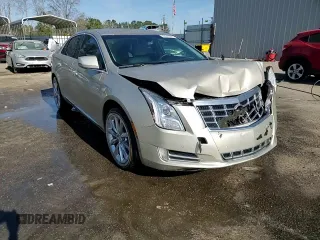 2013 Cadillac XTS Premium z VIN 2G61S5S30D9222930, wystawiony jako Copart lot #48612955 z przebiegiem 70 395 mil mil oraz Szkoda całkowita • Salvage title. Historia ofert i sprzedaży dostępna na DreamBid. Obrazek 13.