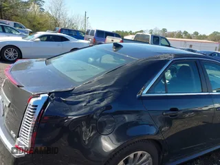 2012 Cadillac CTS Premium with VIN 1G6DP5E3XC0131943, listed as a IAAI auction lot 41747969 with 70,859 mi miles and . Bid and sale history available at DreamBid. Image 6.