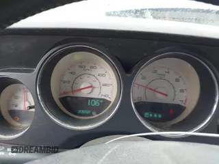 2012 Dodge Challenger SXT Plus with VIN 2C3CDYAG1CH293164, listed as a IAAI auction lot 41936125 with 205,787 mi miles. Bid and sale history available at carsss.com. Image 7.