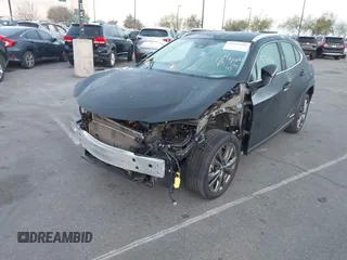 2021 Lexus UX with VIN JTHE9JBH5M2054228, listed as a IAAI auction lot 41651686 with 35,955 mi miles. Bid and sale history available at carsss.com. Image 2.
