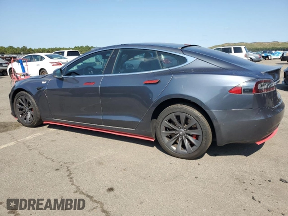 2019 Tesla Model S 100D с VIN 5YJSA1E42KF312803, выставлен на аукционе Copart как лот 71246484 с пробегом 89 820 миль миль и На запчасти • Non repairable. История ставок и продаж доступна на DreamBid. Изображение 2.